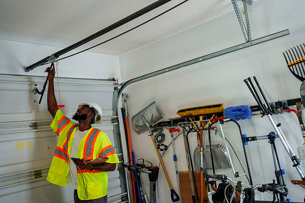 Professional Garage Door Panel Replacement technician working in Redmond, OR